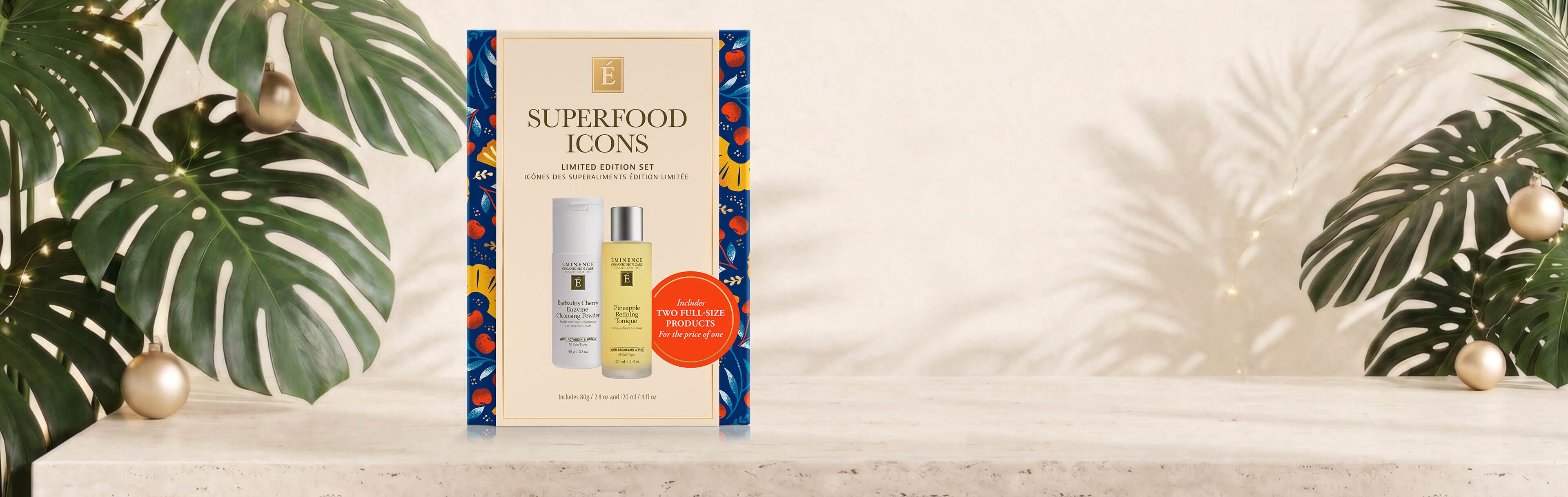 Eminence Organics superfood icons gift set with monstera leaves and ball ornaments