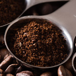 Spoonful of coarse coffee grounds