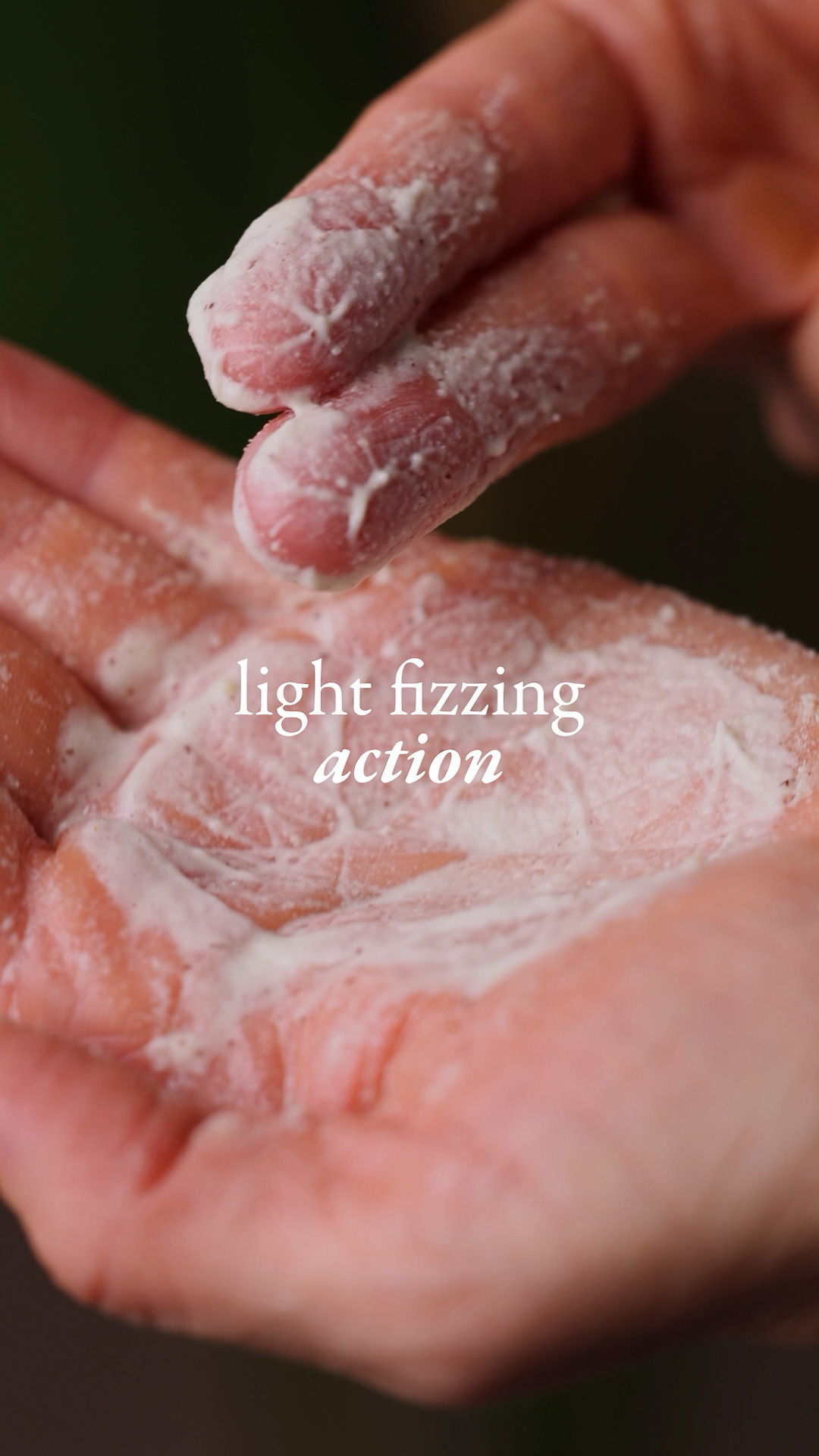 Hands mixing the Eminence Organics Stone Crop Oxygenating Fizzofoliant™ with water