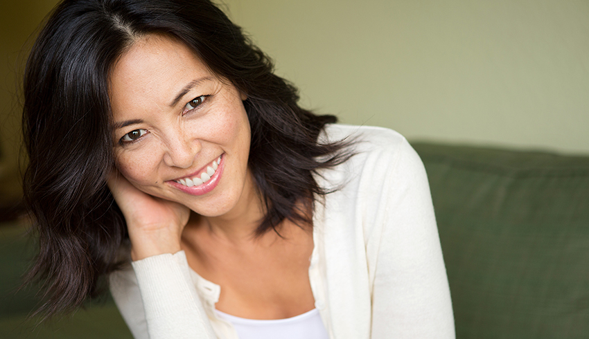 Mature asian woman smiling