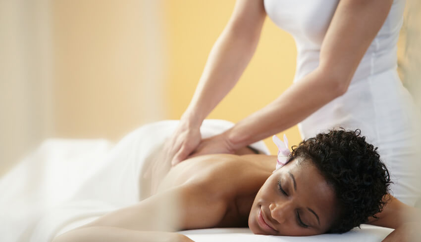 A woman receiving a body massage