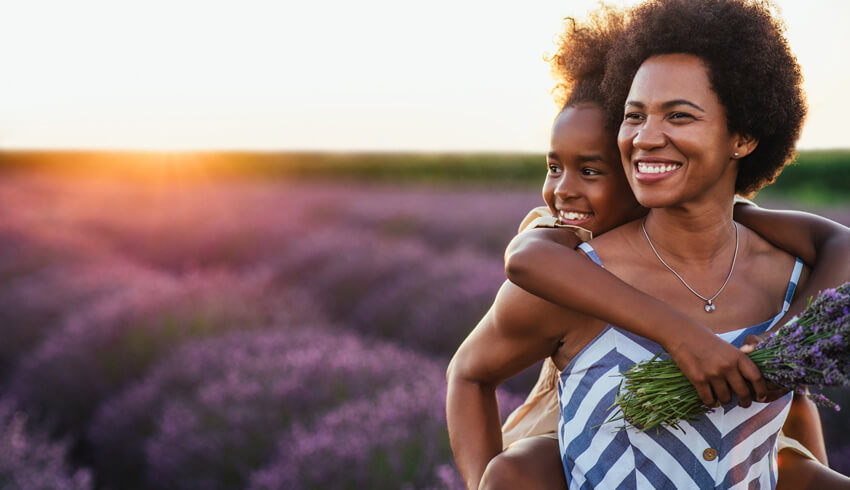 A woman and her daughter in a lavender field