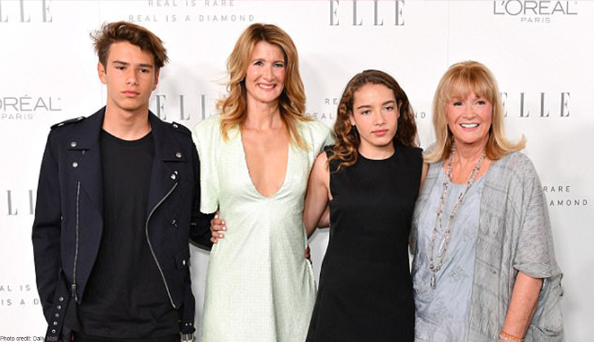 Laura Dern and Diane Ladd pose on the red carpet with Dern's two children