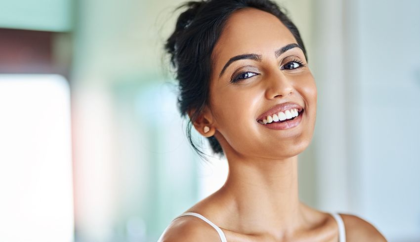 Indian Woman smiling with clear skin