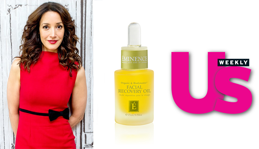 Celebrity Jennifer Beals is shown next to a picture Eminence Organics' Facial Recovery Oil, one of her favorite skin care essentials, and the masthead from Us Weekly.