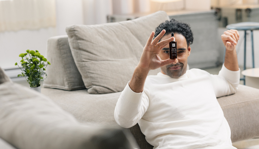 a man holding a serum