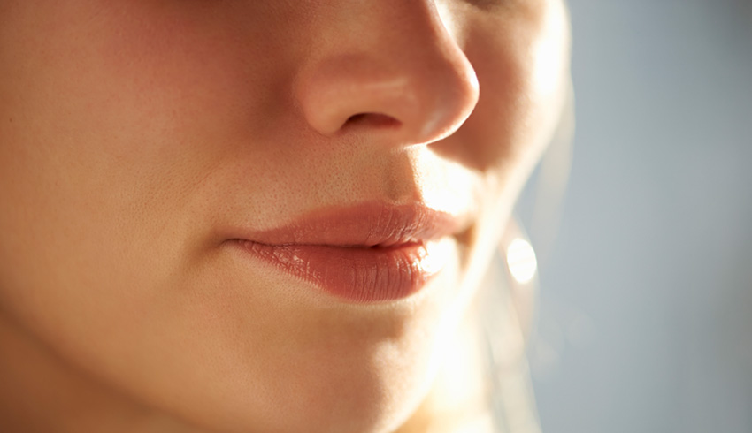 Close up of woman's face showing her nose and lips