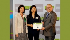 Nilda DeGuzman Eum of Vancouver Community College receiving the Award for Community Involvement and Green Practices from Eminence Organic Brand &amp; Product Creative Director Stephanie Baresh and Vancouver Community College President Dr. Peter Nunoda. 
