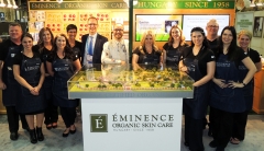Eminence Organic Staff standing outside the company booth at the ISPA Conference &amp; Expo.
